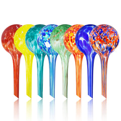 Mission Gallery front view of eight glass watering globes, time-saving irrigation