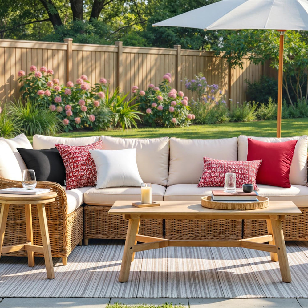 miulee pair of royal blue pillows styled on patio sofa adding color to outdoor space