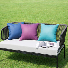 MIULEE pillow on patio chair styled to show protection and aesthetic upgrade