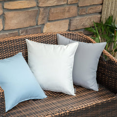 MIULEE pillow on patio sofa shows weather-ready comfort and style