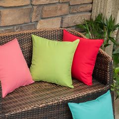 MIULEE red pillow placed on outdoor patio sofa resisting splashes