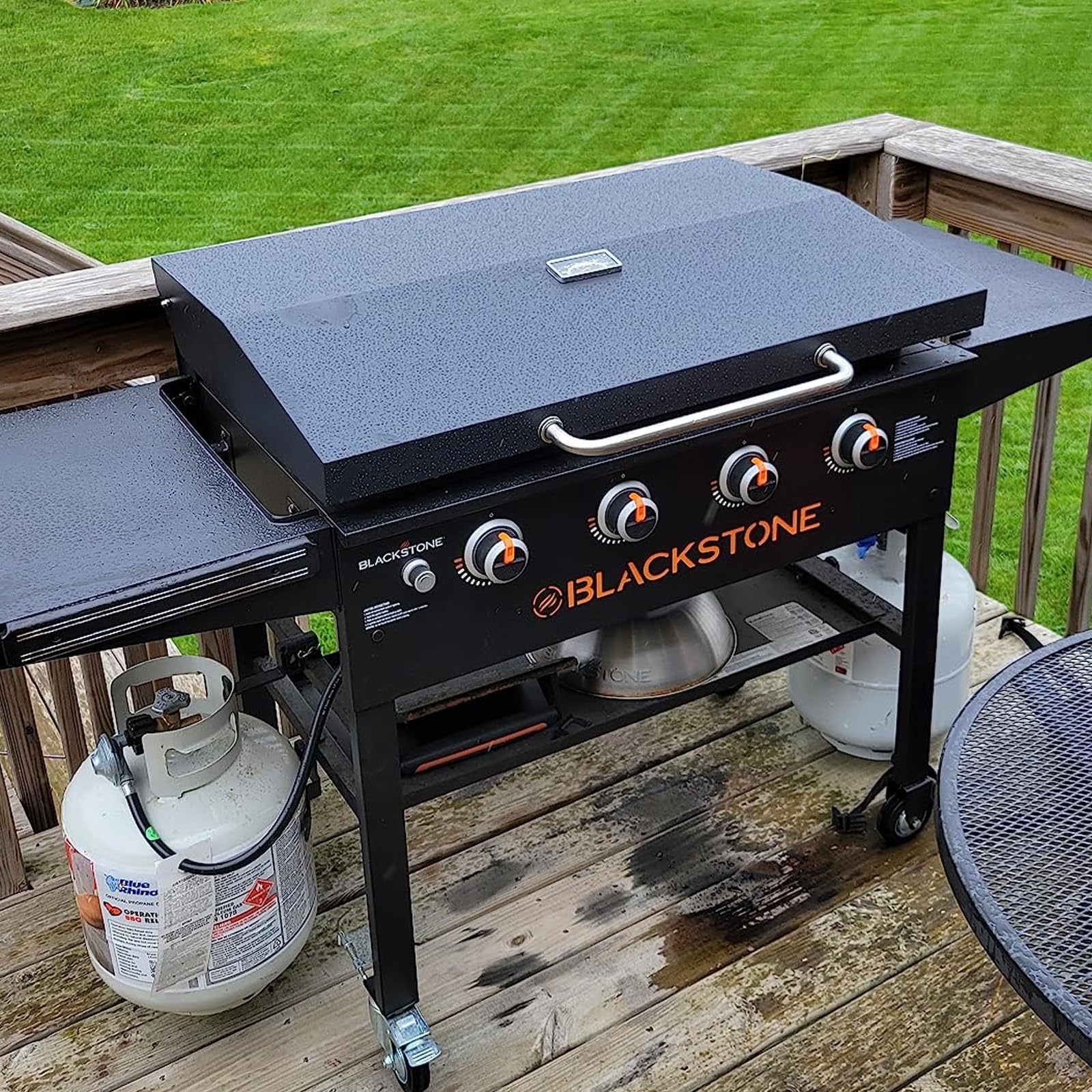 MixRBBQ lid installed on Blackstone griddle during backyard cooking