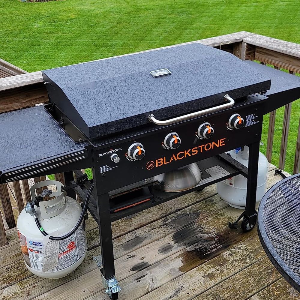MixRBBQ lid installed on Blackstone griddle during backyard cooking