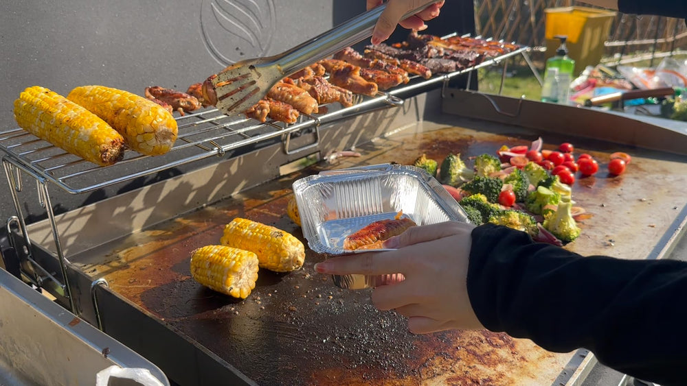 MixRBBQ installed on griddle showing raised indirect-heat cooking zone