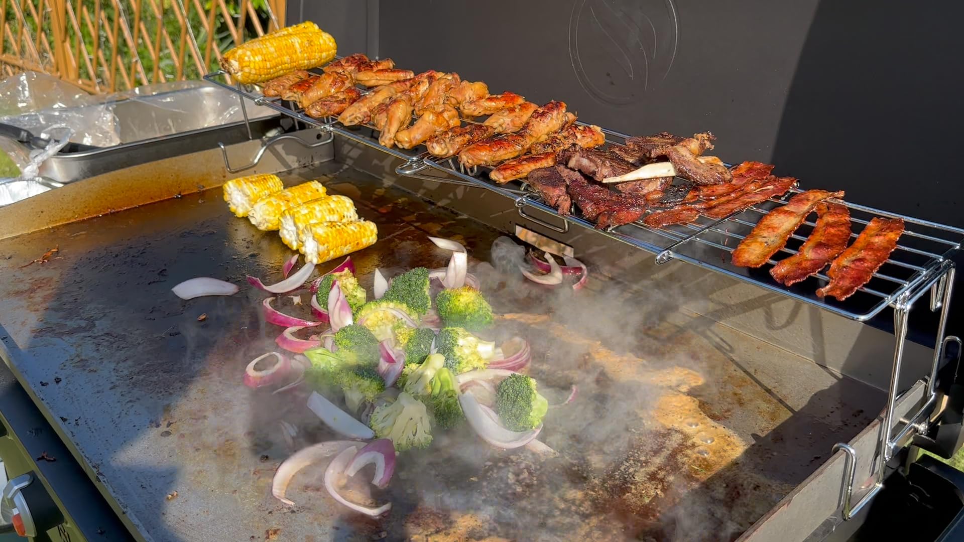 MixRBBQ warming rack next to tape measure showing adjustable length and fit