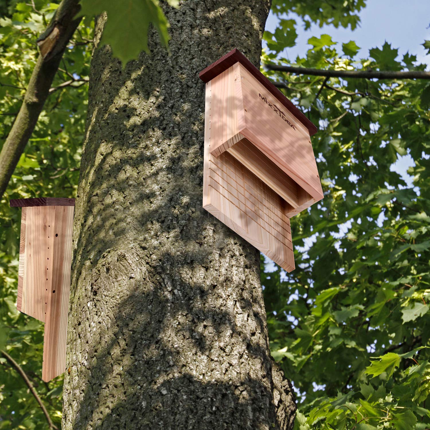 MIXXIDEA bat house in garden setting showing natural integration benefit