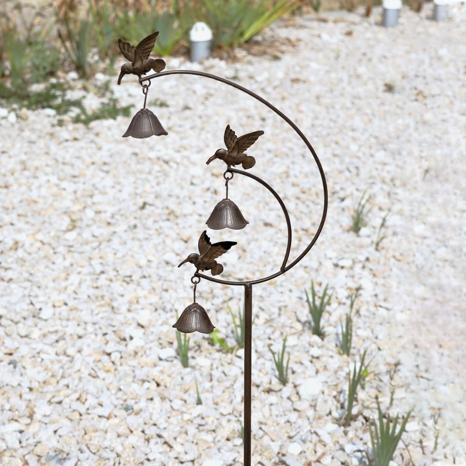 MNRYLKB hummingbird stake in a patio setting illustrating visual interest and ambiance