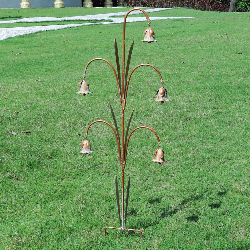 MNRYLKB stakes in garden setting adding vertical color and focal interest