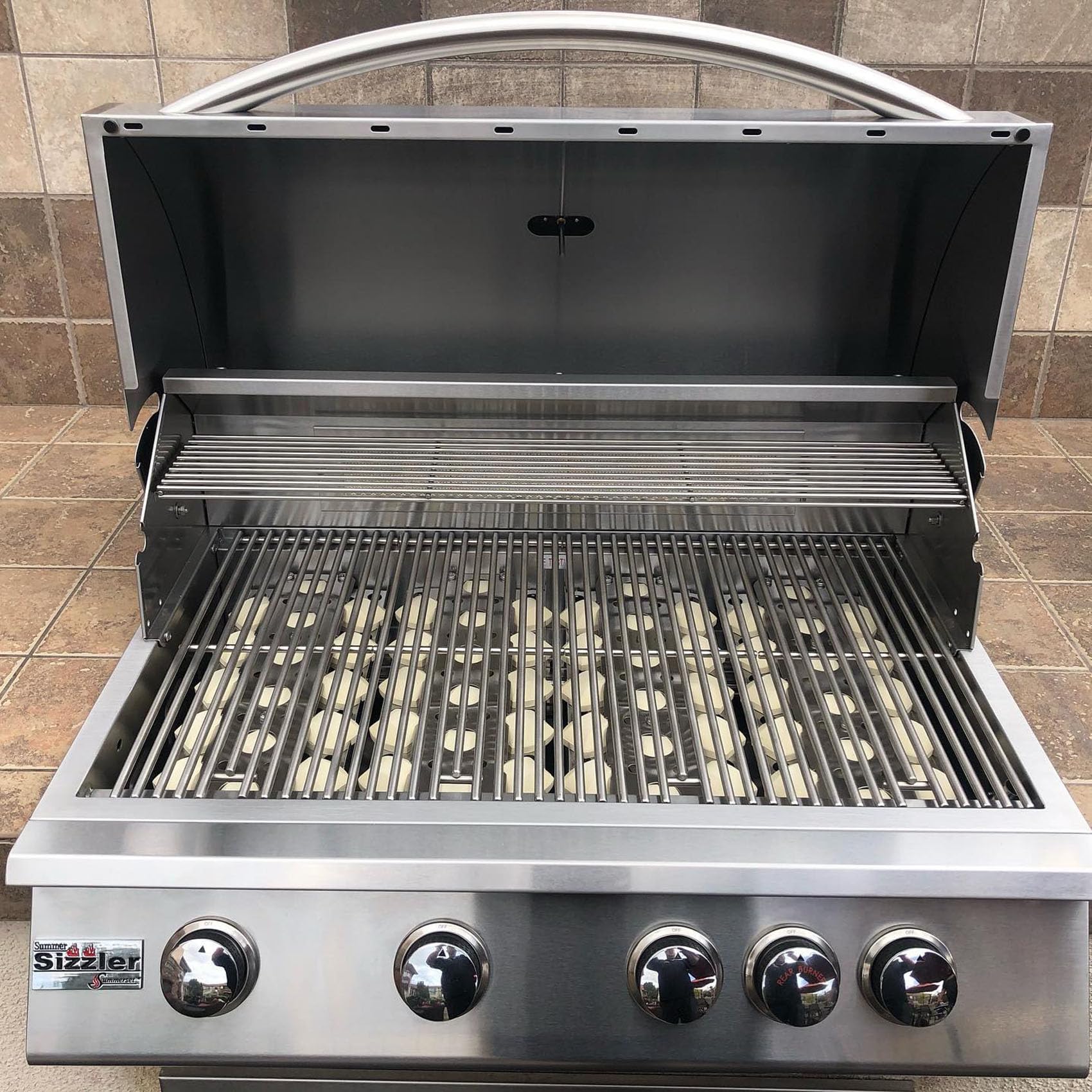 MOASKER lifestyle photo of grill in backyard illustrating restored cooking performance