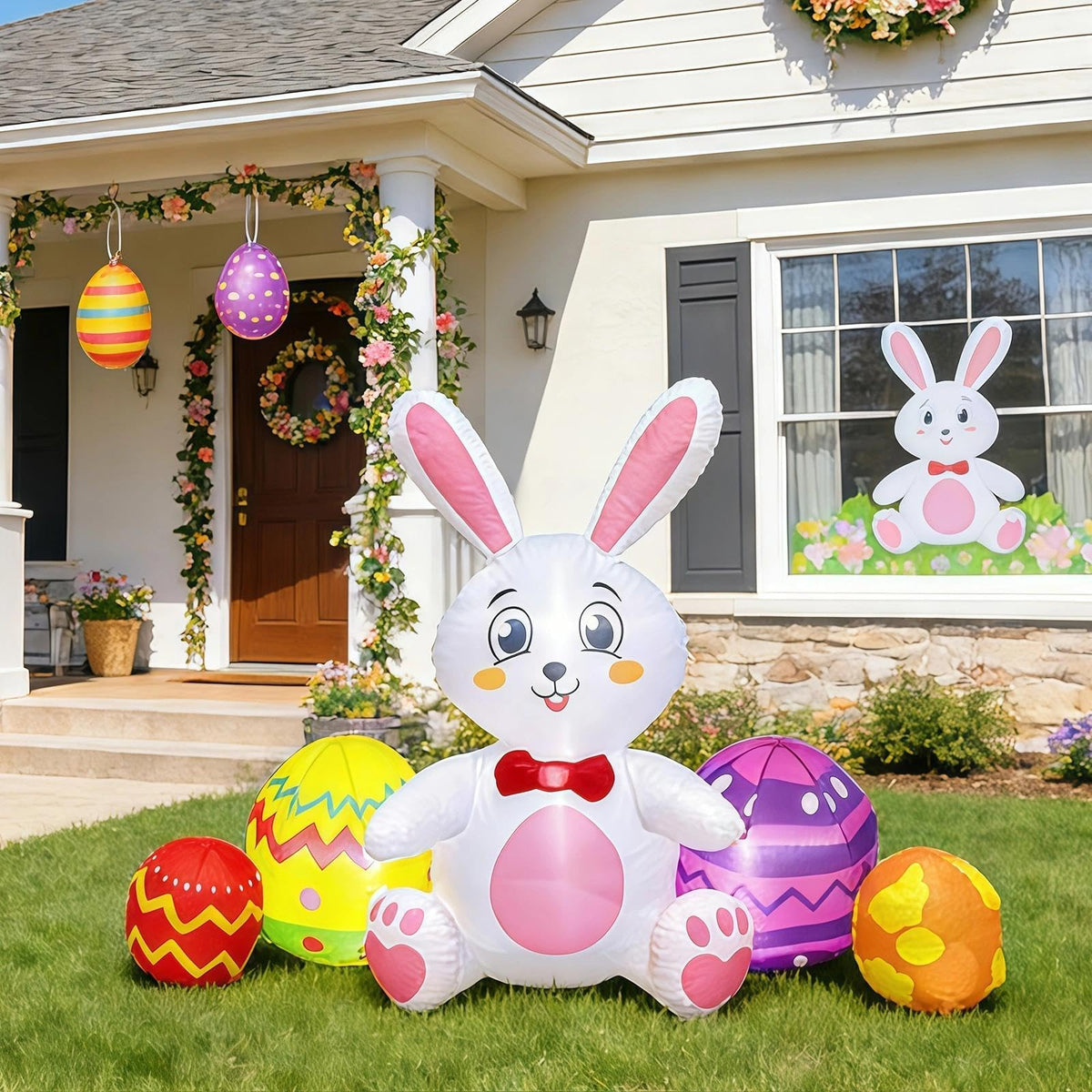 Mobpqable front view of inflatable bunny and four eggs, bright curb appeal