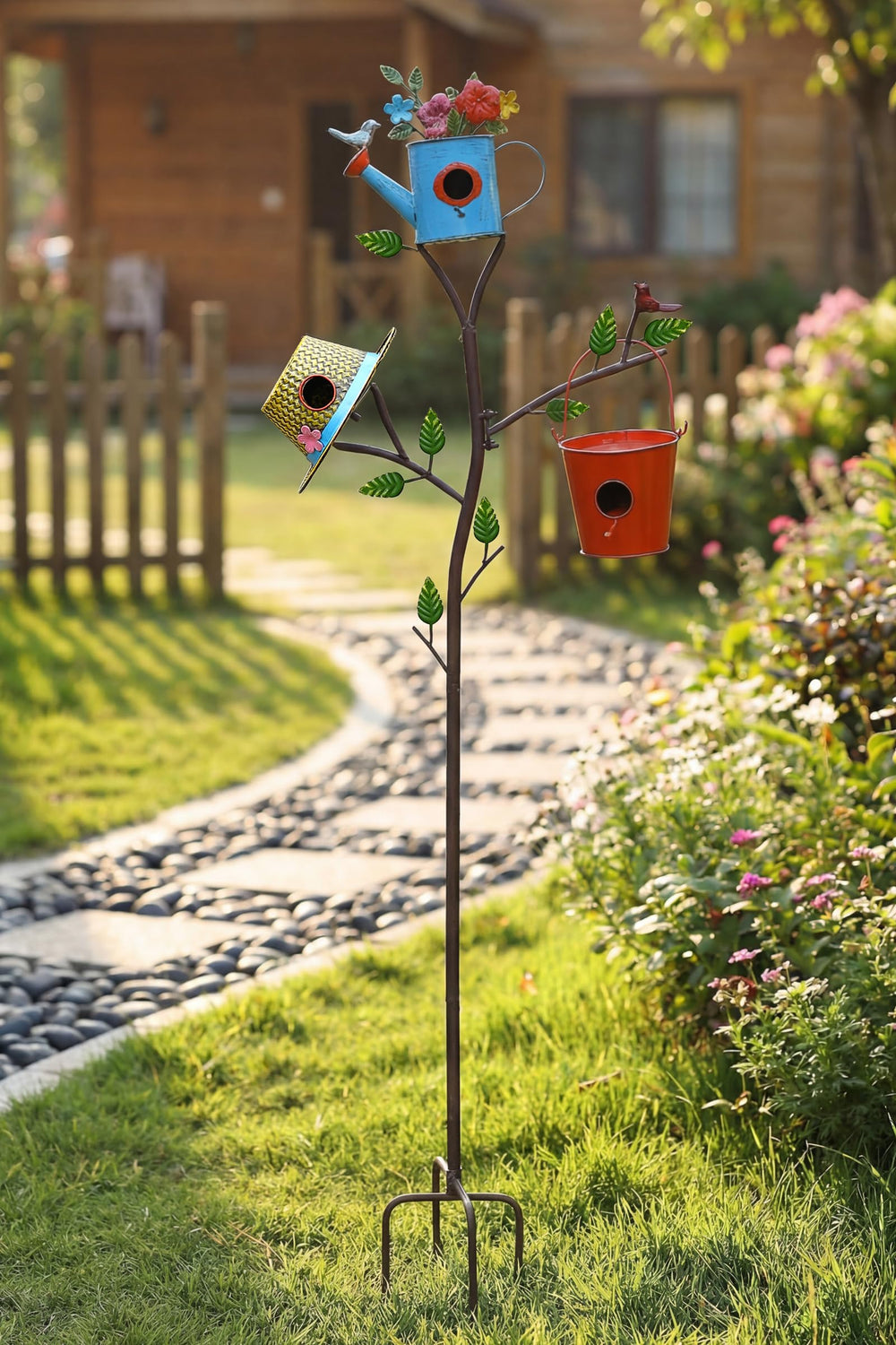 MOCOME garden scene with the pole among plants adding charm and inviting birds