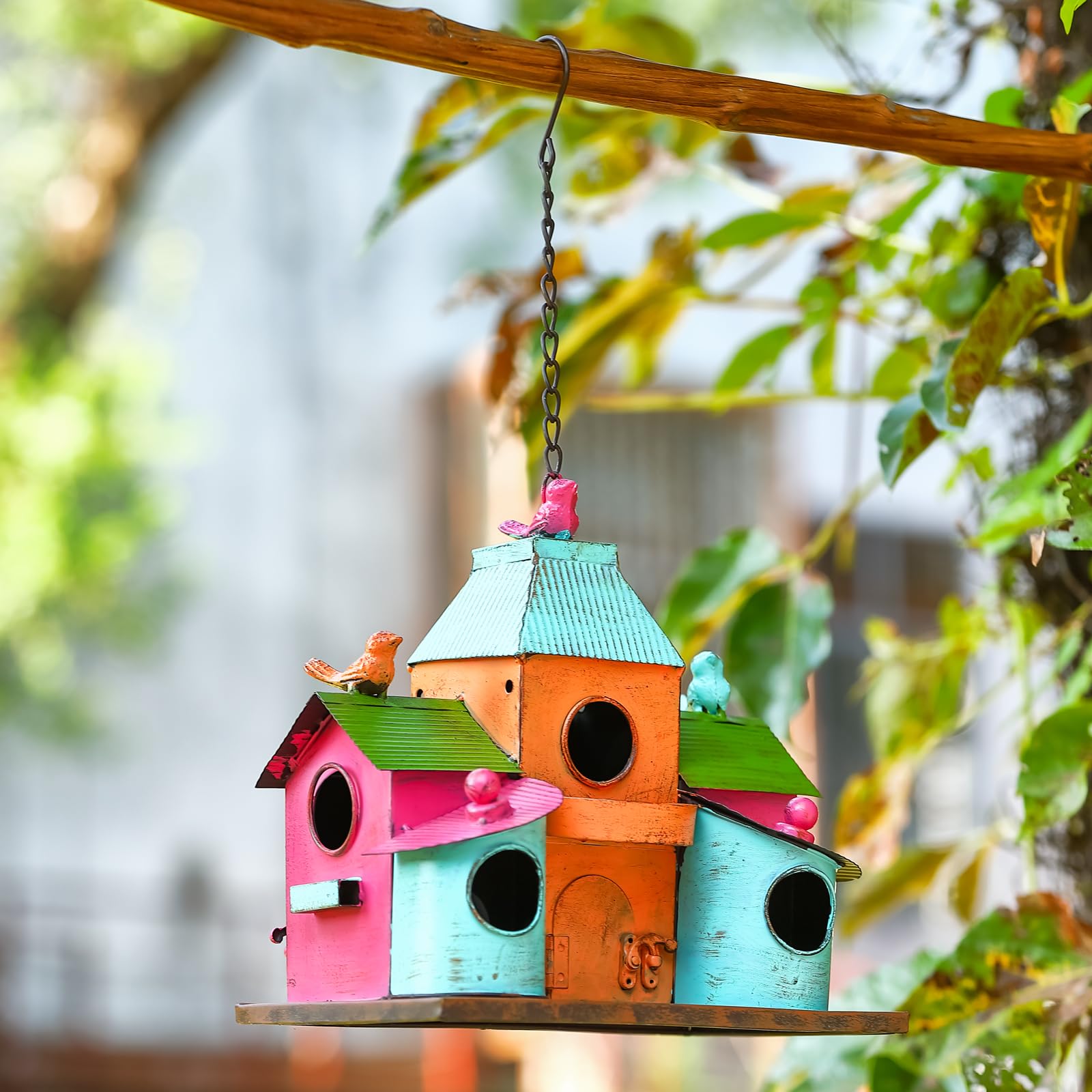 MOCOME on a porch with plants illustrating decorative function and bird attraction