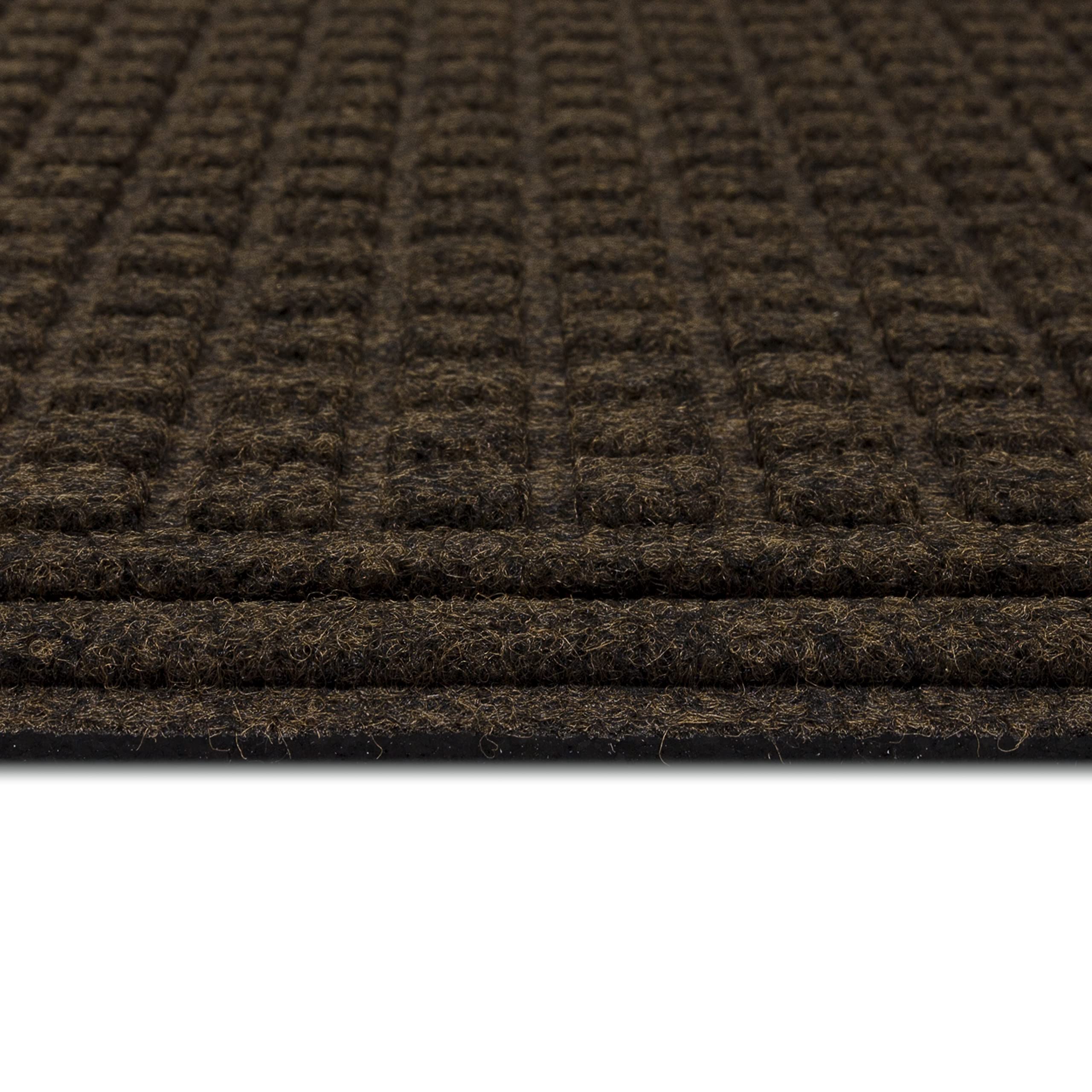 Mohawk Home doormat on porch in use with shoes removing debris before entering