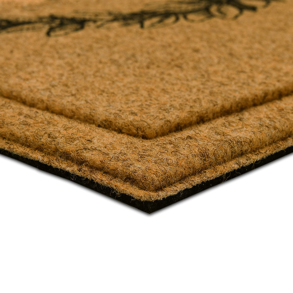 Mohawk Home mat beside a shoe and door for scale illustrating compact size