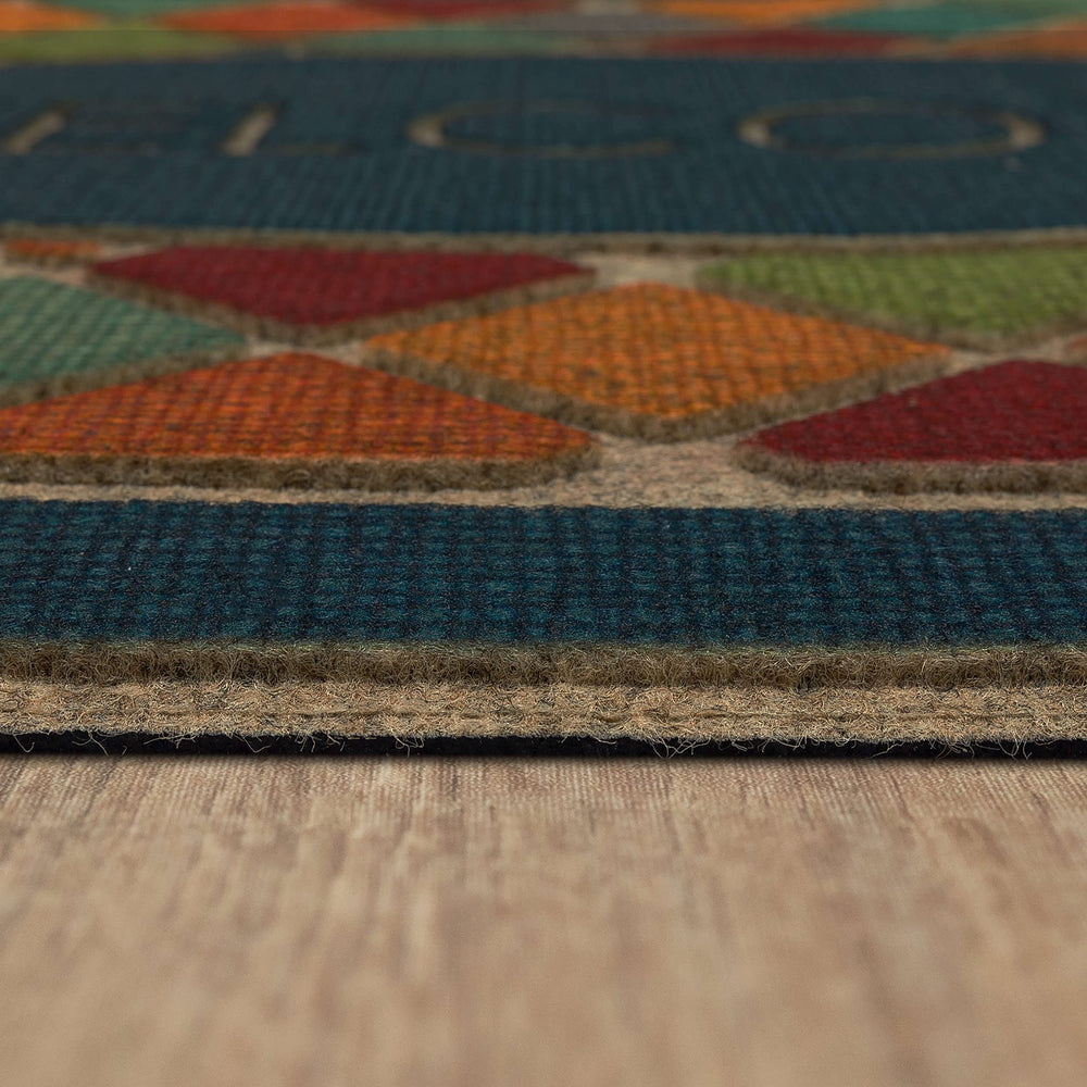 Mohawk Home mat styled at an entrance offering welcoming, weather-ready look