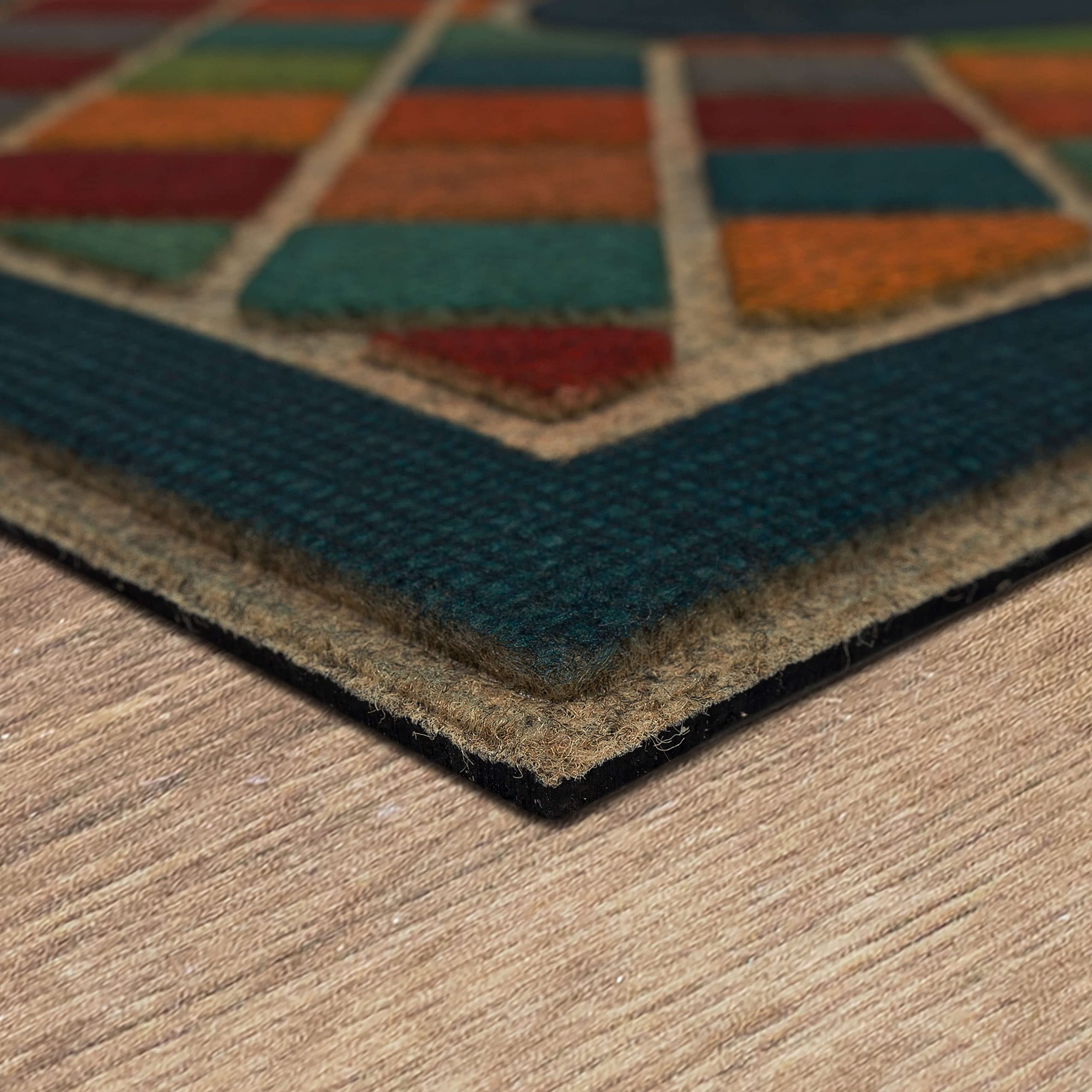 Mohawk Home 2x4 mat next to door showing low-profile clearance advantage