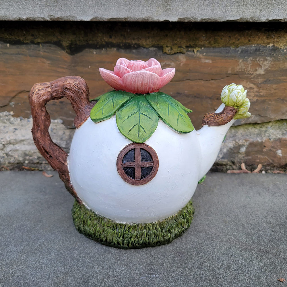 Mokoboho teapot house placed in garden scene adding instant fairy charm