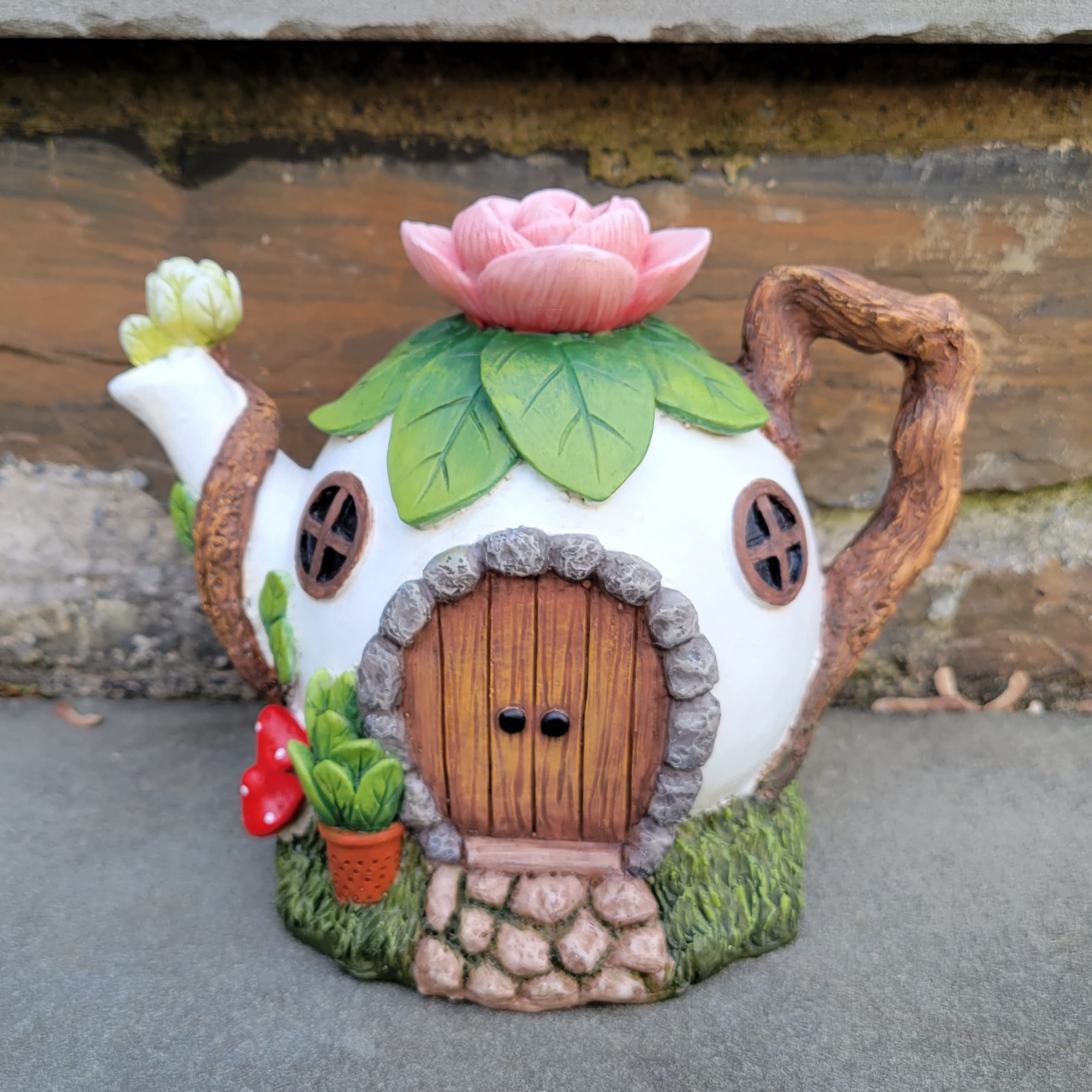 Mokoboho teapot next to succulent illustrating size and placement ideas