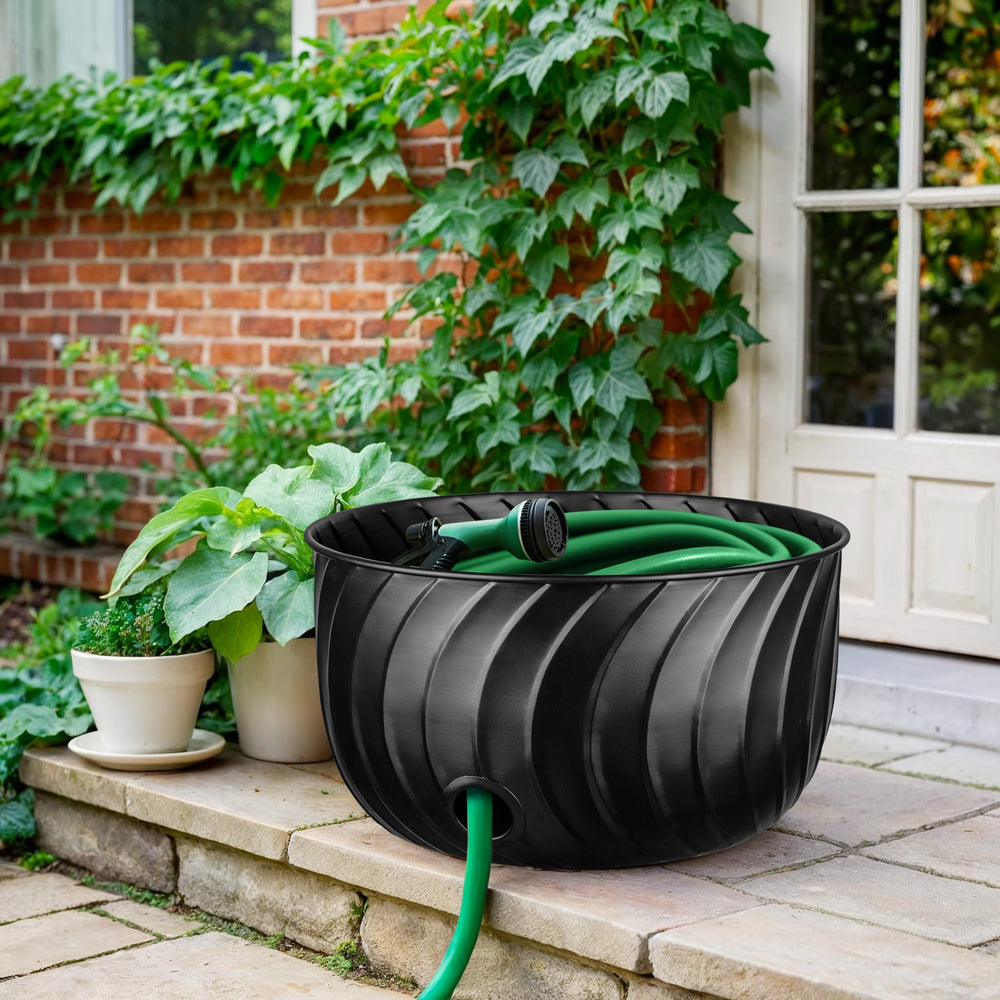 Monarch Abode beside fully coiled 100ft hose for size reference