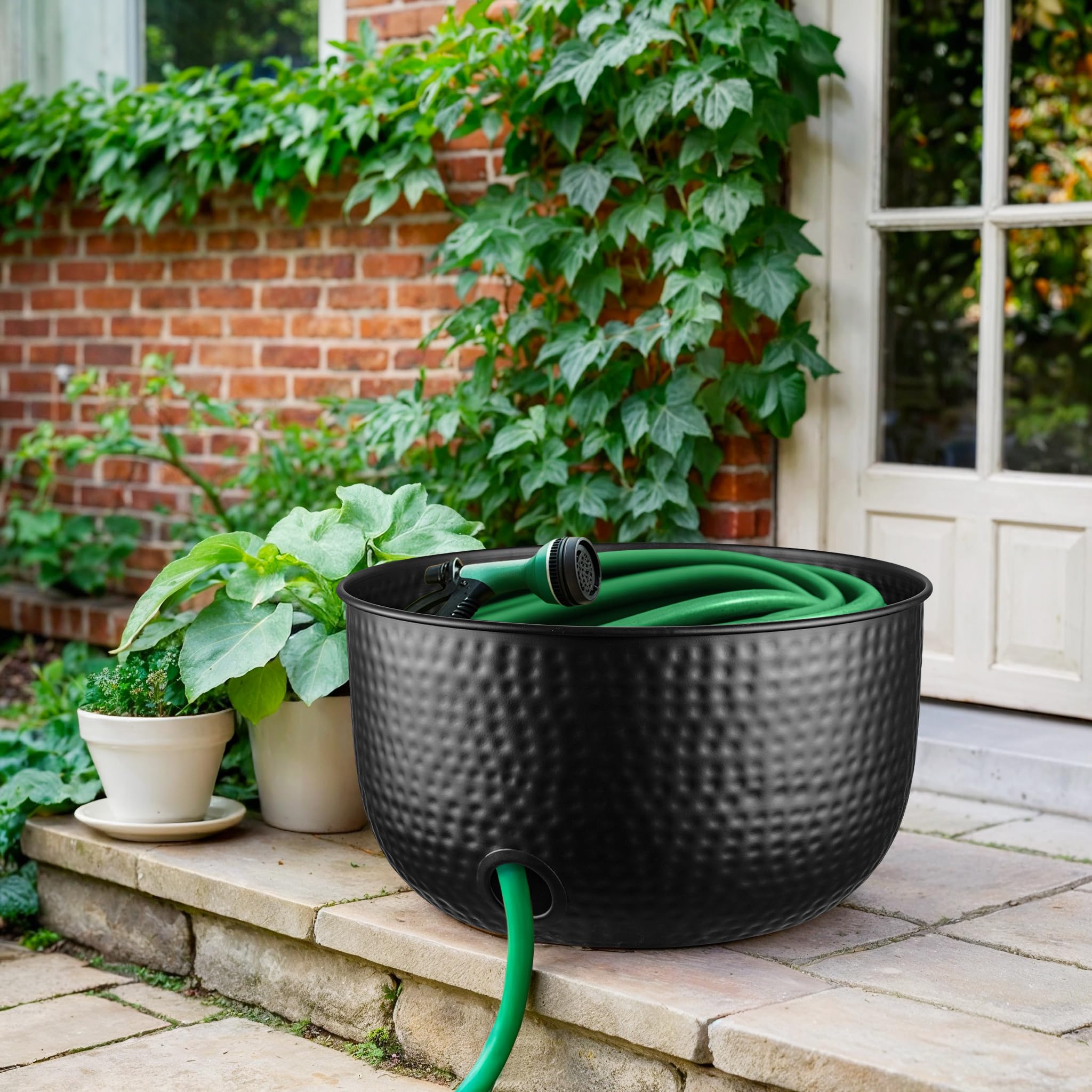 Monarch Abode next to coiled hose for size comparison and capacity visualization