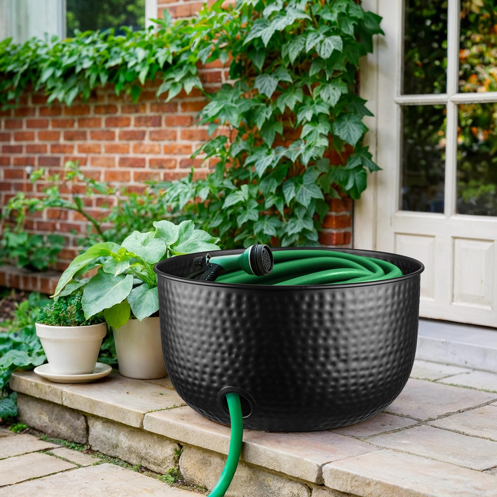 Monarch Abode next to coiled hose for size comparison and capacity visualization