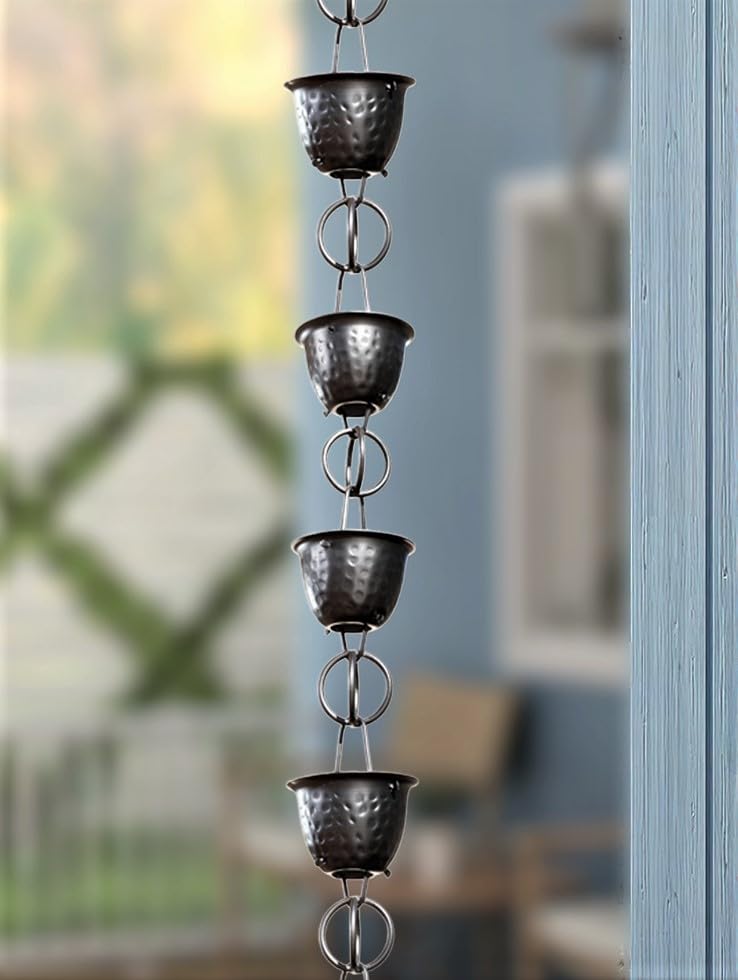 Monarch Rain Chains installed in gutter with water flowing, adding curb appeal