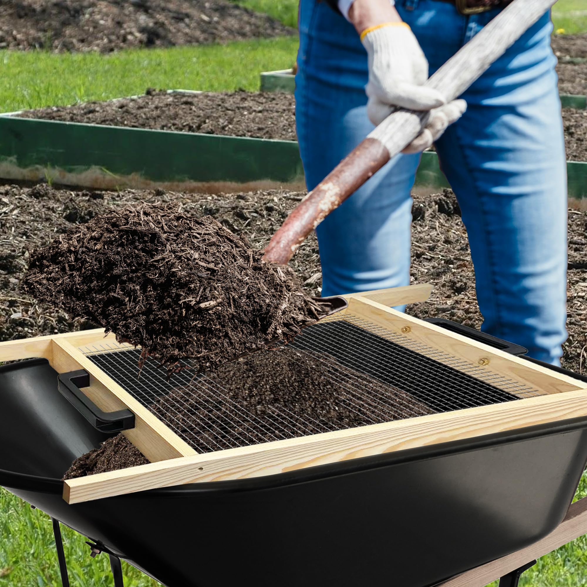 Montex sifter placed on a wheelbarrow demonstrating hands-free convenience