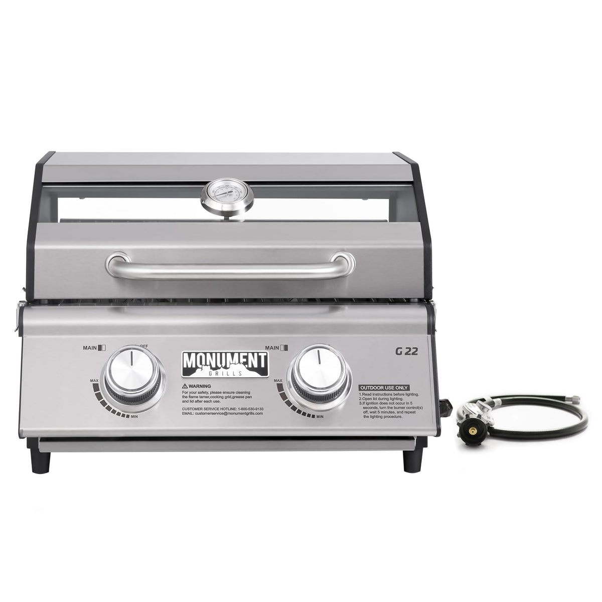 Monument Grills front view showing compact stainless-steel body and grilling surface for portability