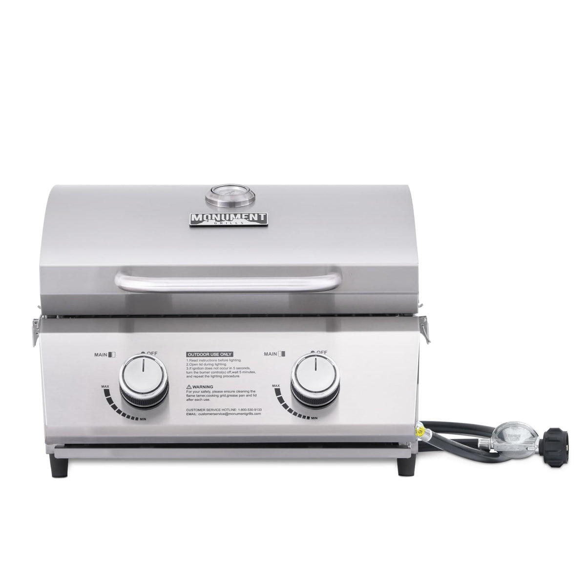 Monument Grills front view with closed lid showing compact portability and secure travel locks