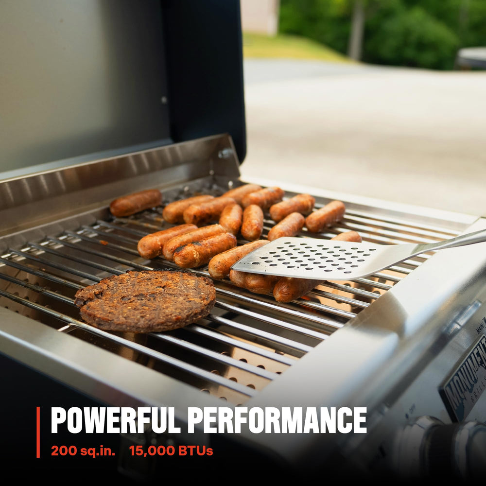Monument Grills size comparison next to a cooler to show compact trunk-friendly portability