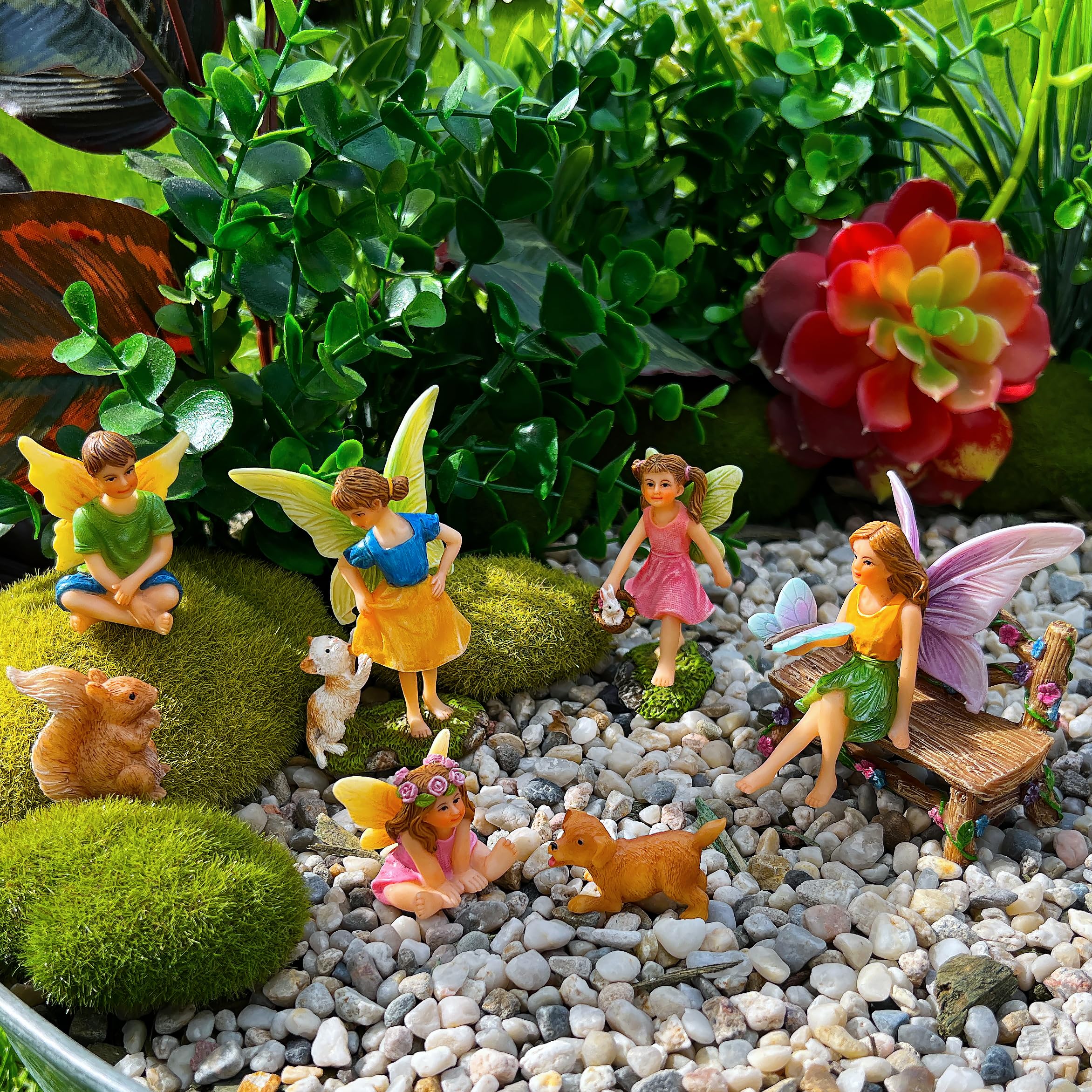Outdoor tabletop garden scene with Mood Lab figurines enhancing patio or balcony decor