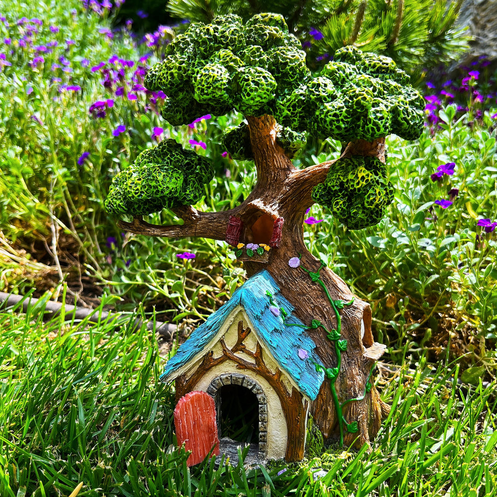 Mood Lab tree house placed in terrarium adding whimsical indoor garden interest