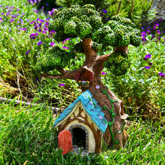 Mood Lab tree house placed in terrarium adding whimsical indoor garden interest