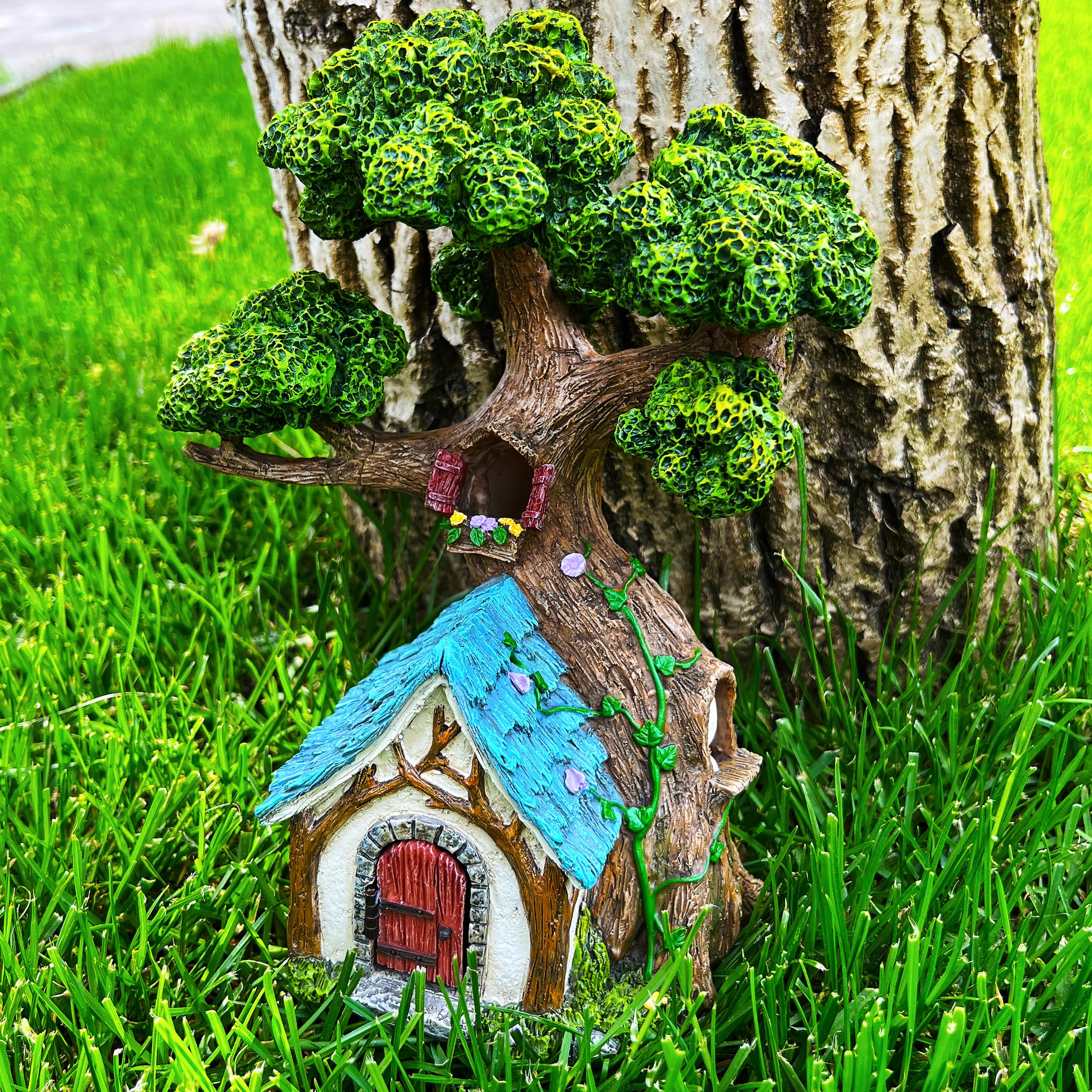 Mood Lab tree house next to hand for scale illustrating 8.5-inch size benefit