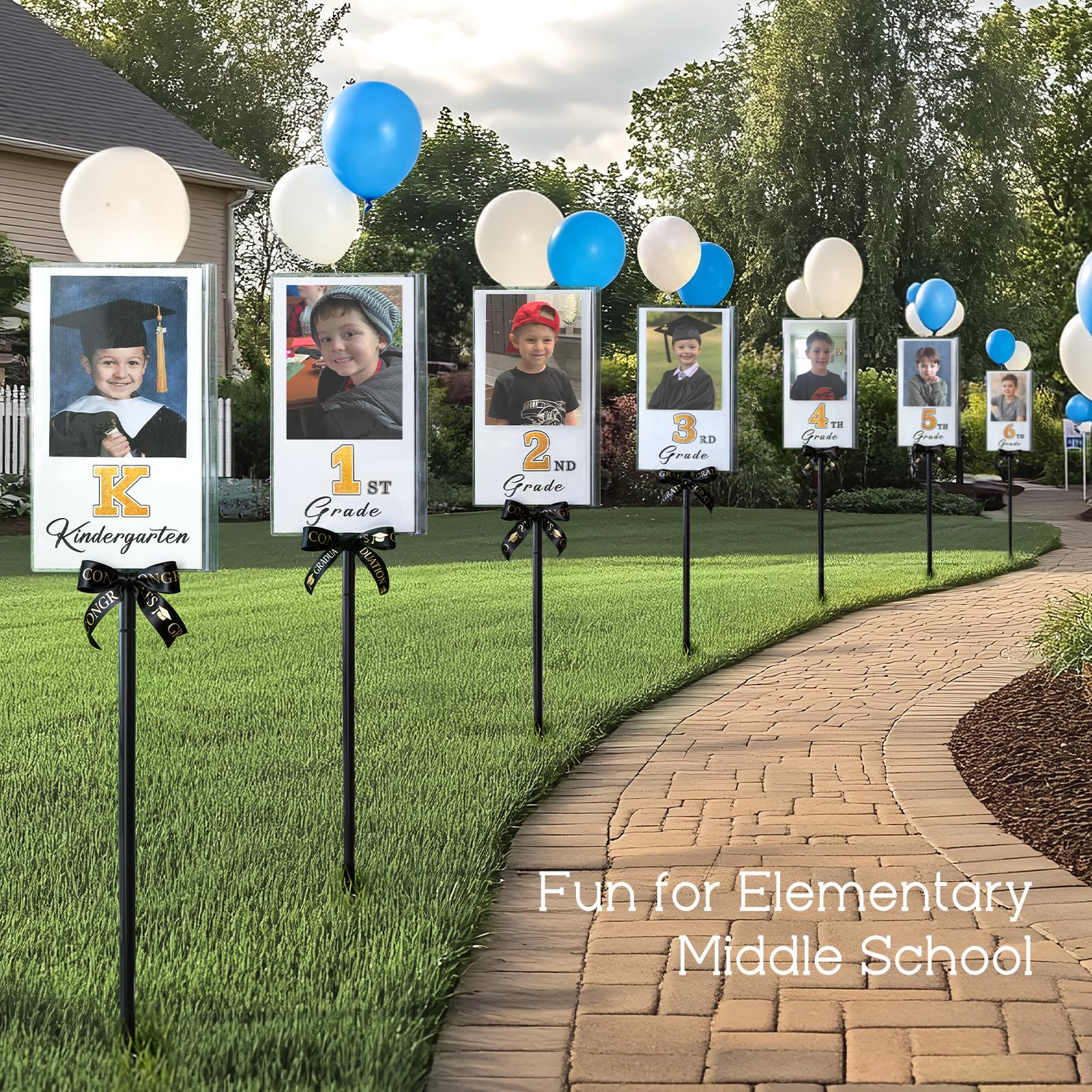 MOREDOTS yard installation displaying class photos and festive impact
