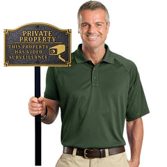 Morgtta sign on stake mounted in yard offering visible property notice