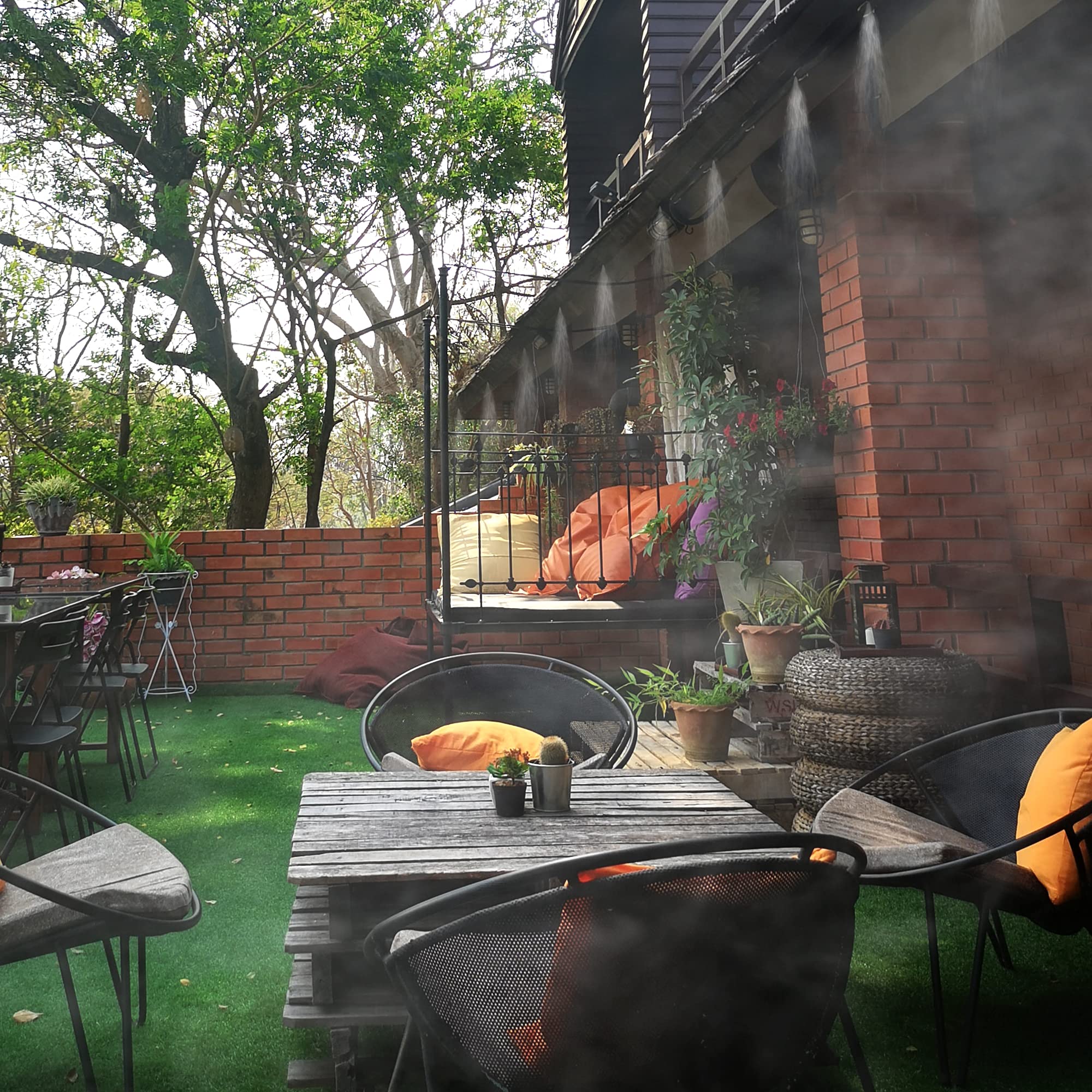 Mornajina mist line installed on a patio rail providing cooling comfort outdoors