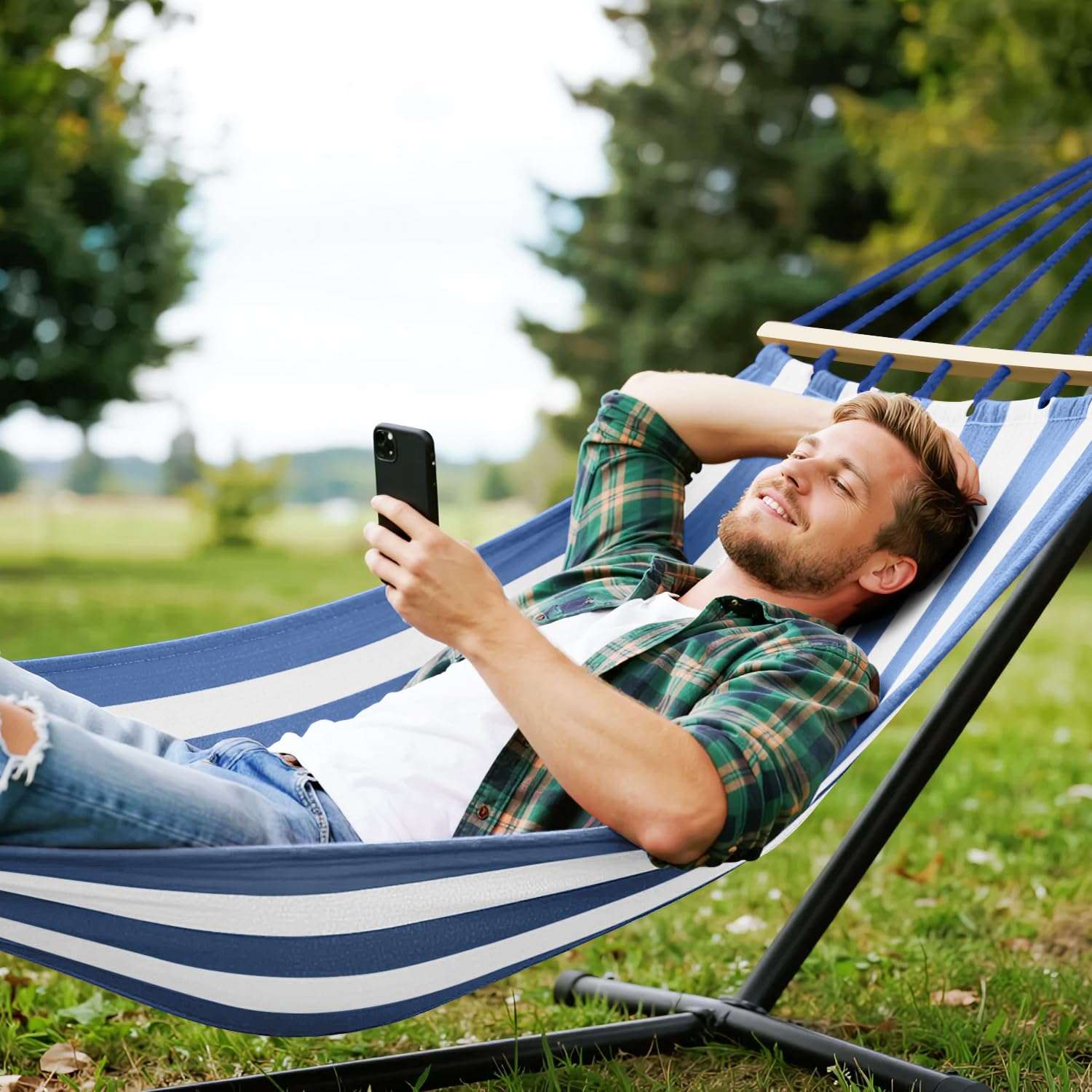 MOSFiATA hammock in use in a backyard showing stable anti-roll support