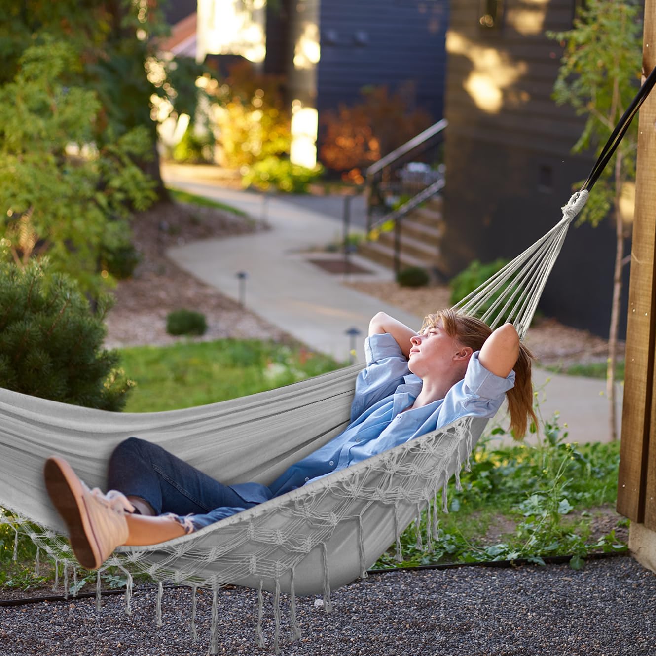 MOSFiATA hammock hung in garden showing comfortable outdoor relaxation
