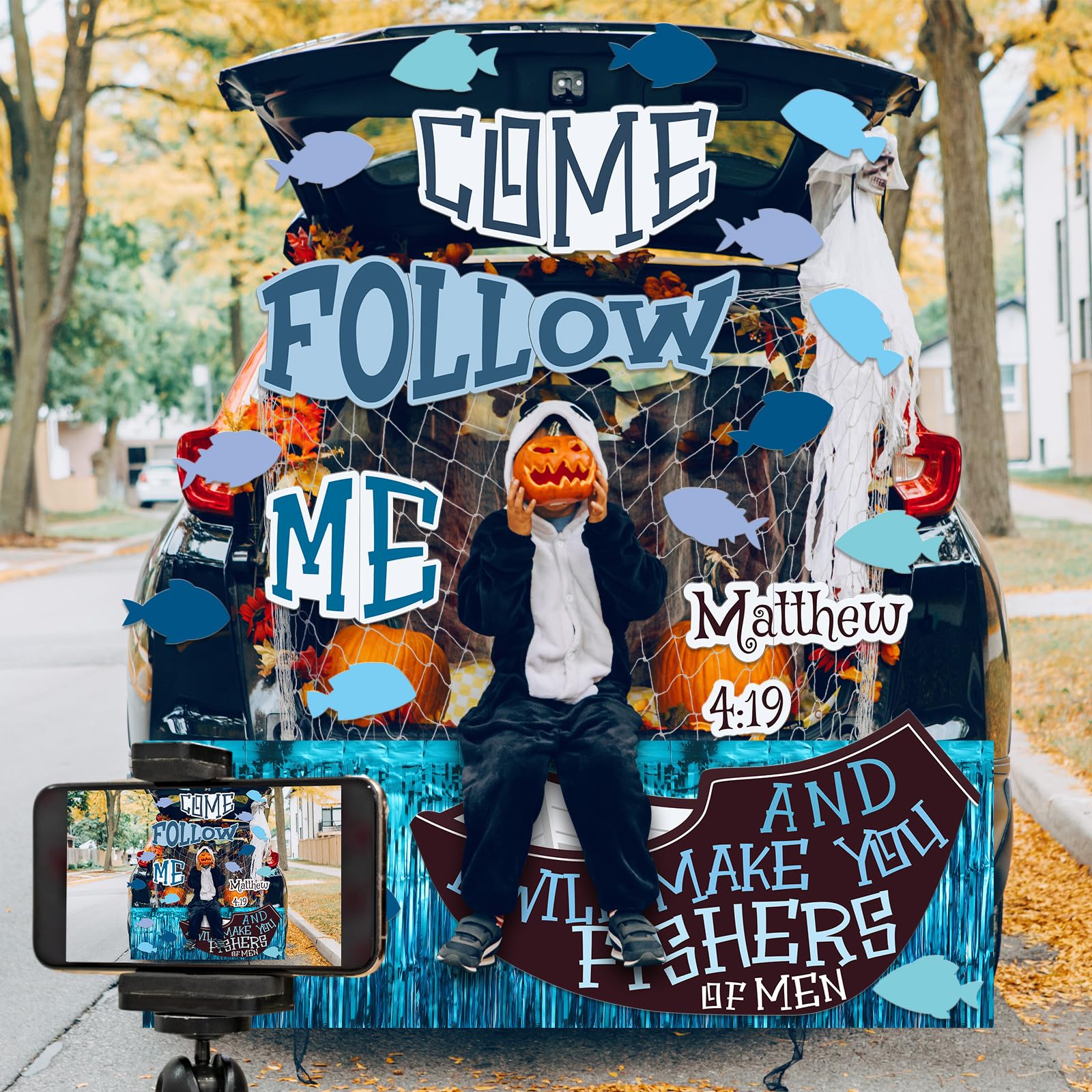 MotiMind trunk display in use attracting trick-or-treaters with faith-themed decor