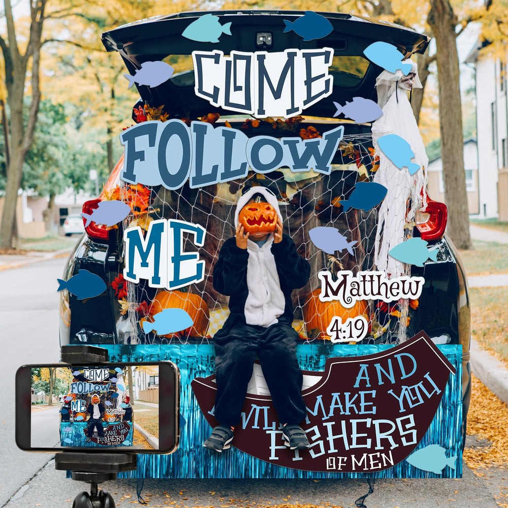 MotiMind trunk display in use attracting trick-or-treaters with faith-themed decor