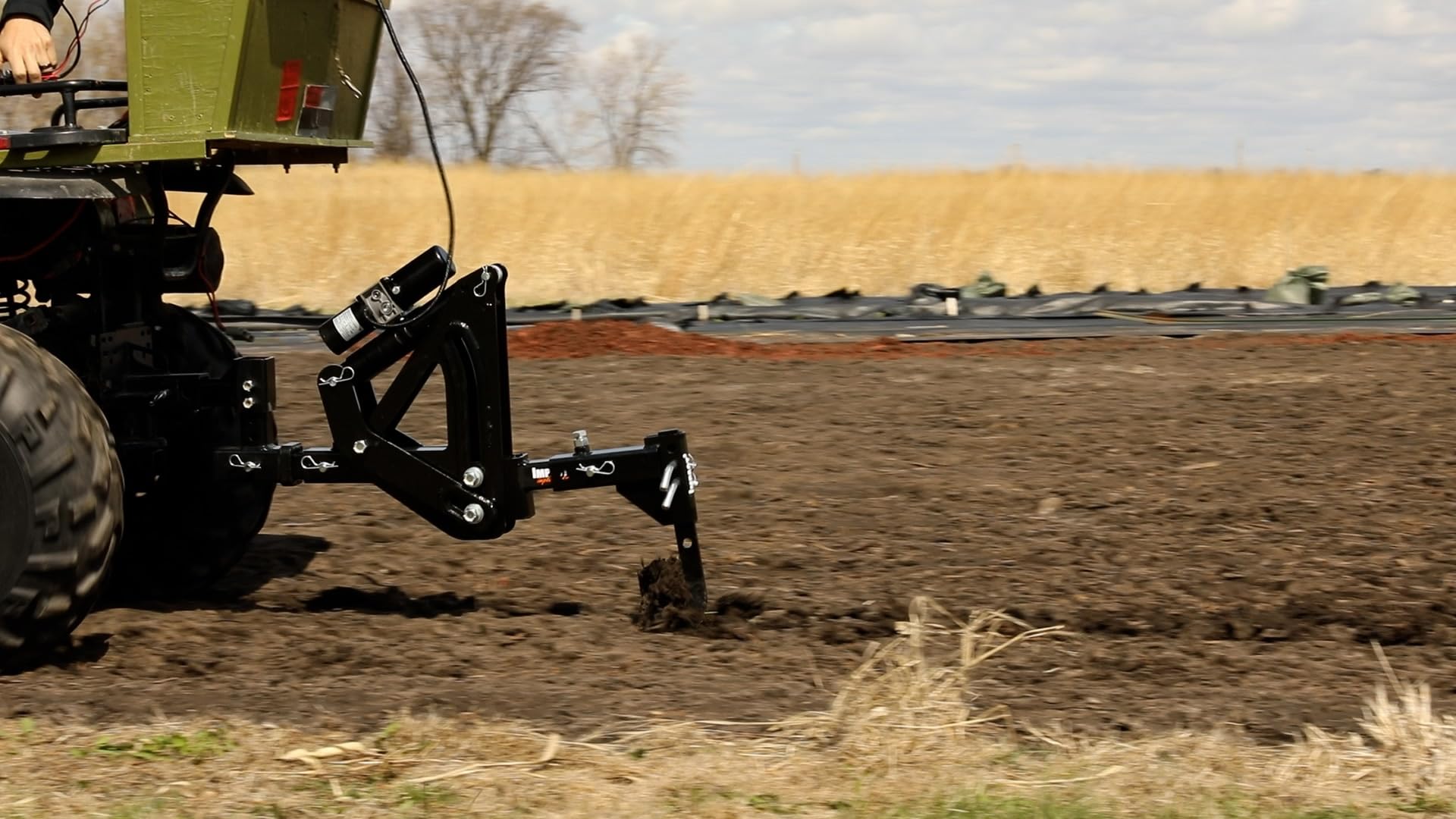 MotoAlliance Middle Buster used in a vegetable plot, creates clean planting furrows