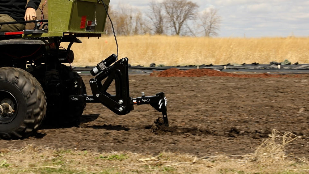MotoAlliance Middle Buster cutting through roots in a field, fast soil penetration benefit