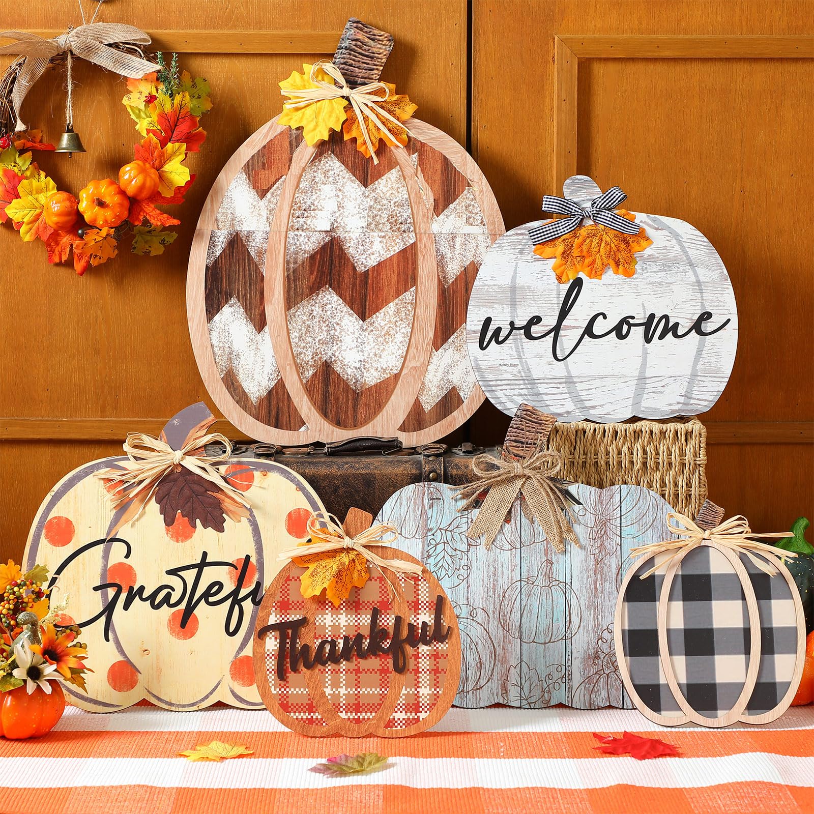Moucuny styled on front entrance with leaves conveying warm autumn ambiance benefit