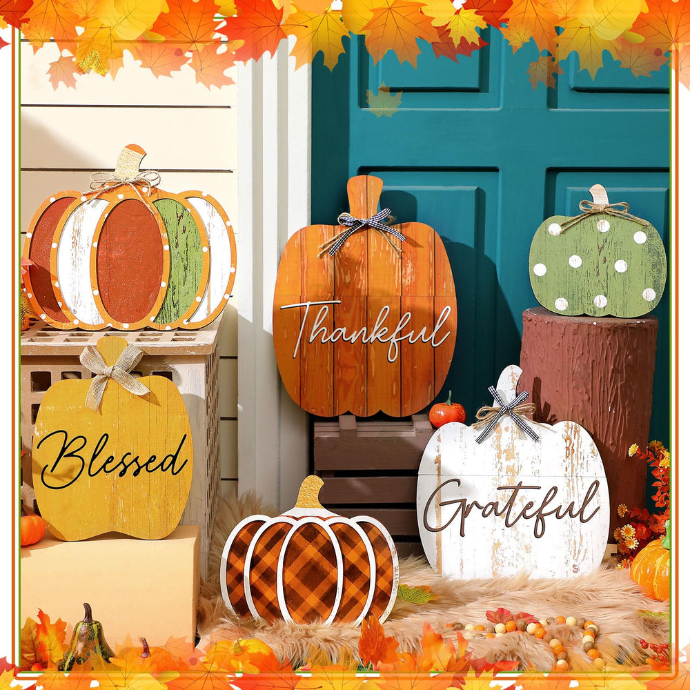Moucuny size comparison with ruler demonstrating varied pumpkin lengths
