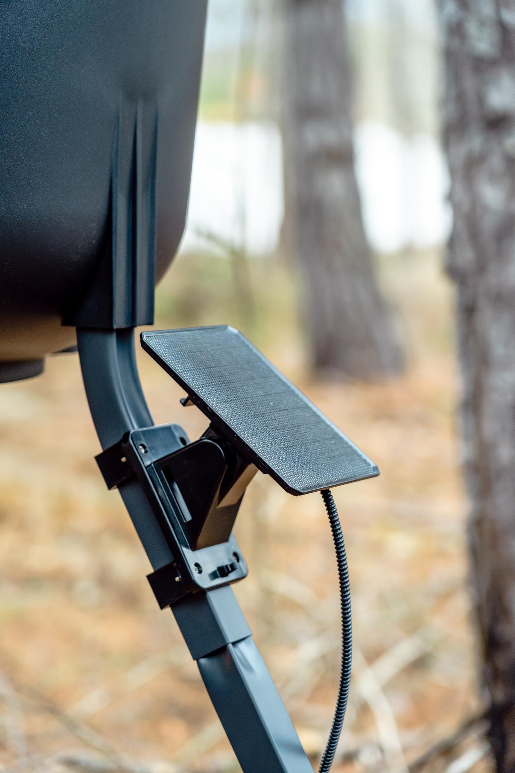 Moultrie solar panel mounted on feeder demonstrating hands-free charging in place