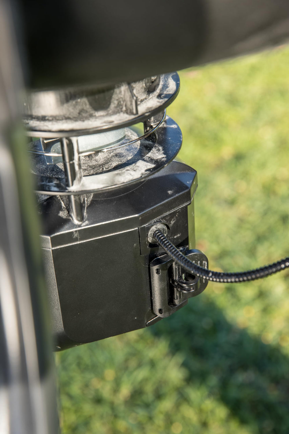 Moultrie panel beside 6V tab-top battery showing size comparison and power compatibility