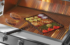 Mr. Bar-B-Q basket in use on grill with vegetables showing even cooking benefit