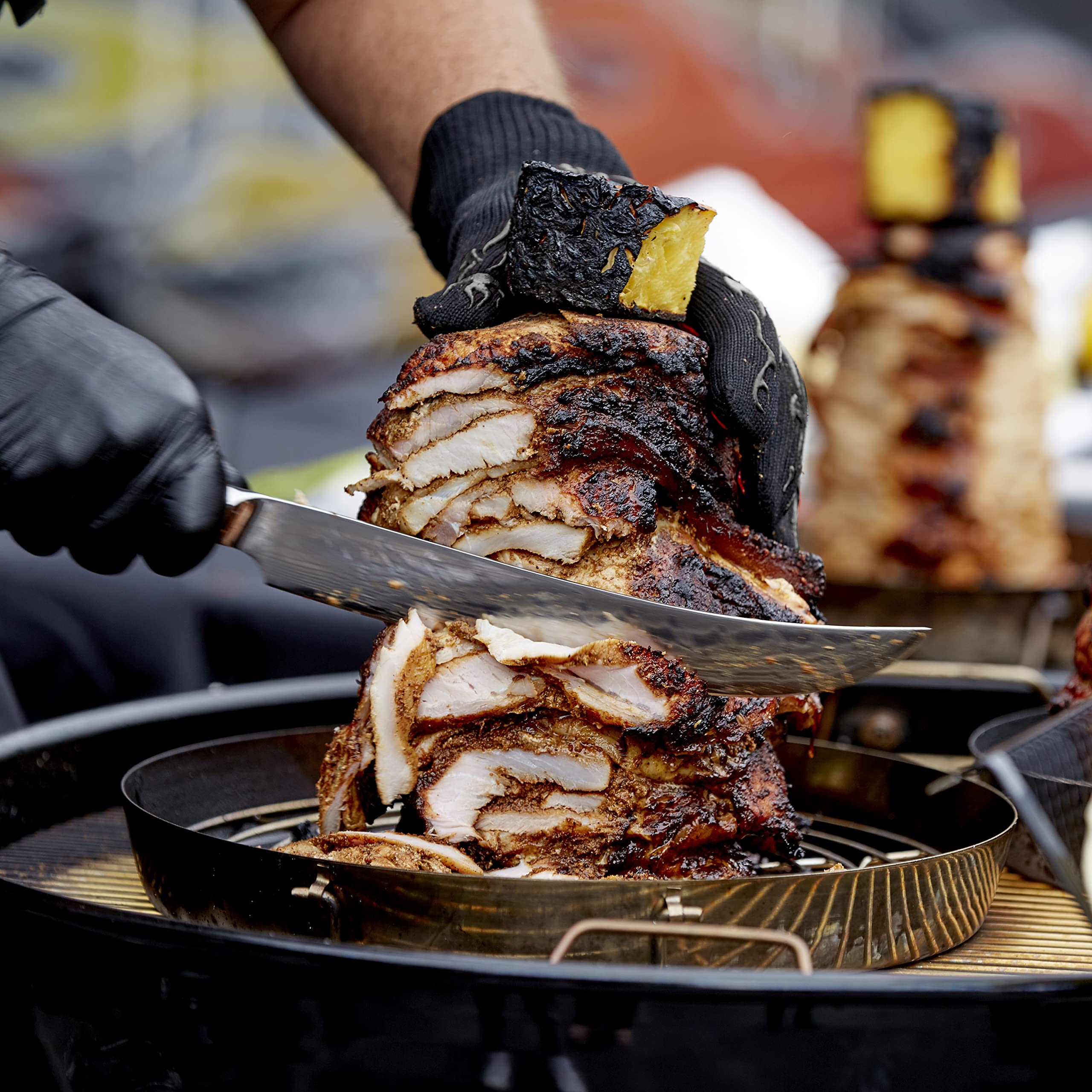 Mr. Bar-B-Q griller beside a hand showing scale and portability benefit