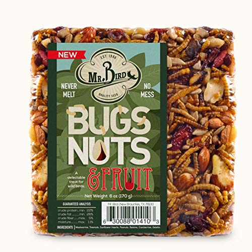 Mr. Bird close-up of cake texture with visible mealworms, nuts and fruit, highlights high-quality ingredients